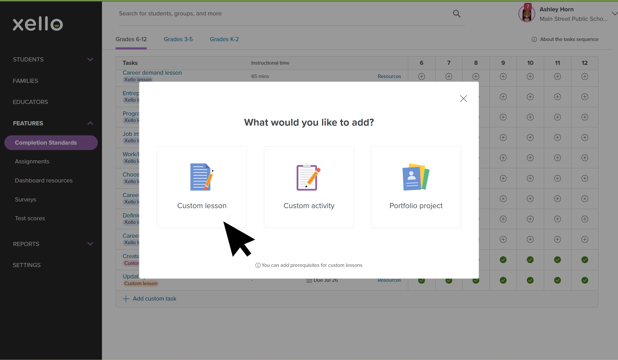 Click to enlarge Educator account in Xello. The modal to add custom tasks is open and the cursor is selecting Custom lesson.